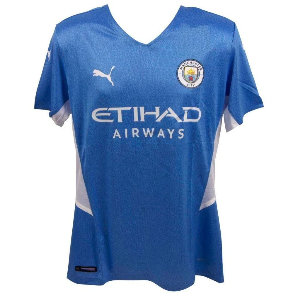 Light blue Manchester City jersey with white accents signed by Kalvin Phillips