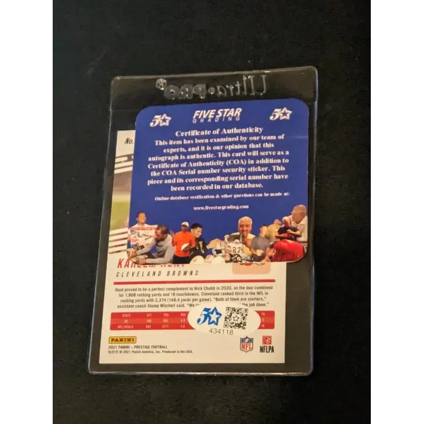Football trading card in protective case featuring Kareem Hunt Cleveland Browns autographed card