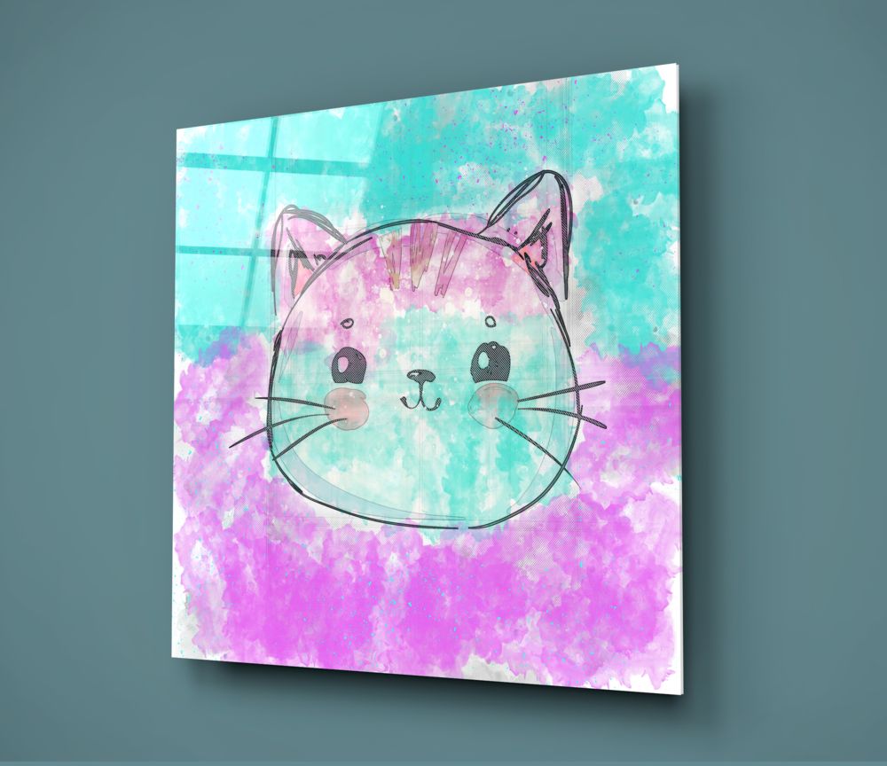 Angled view of glass wall art featuring a smiling cat face with pink ears on turquoise and magenta watercolor background.