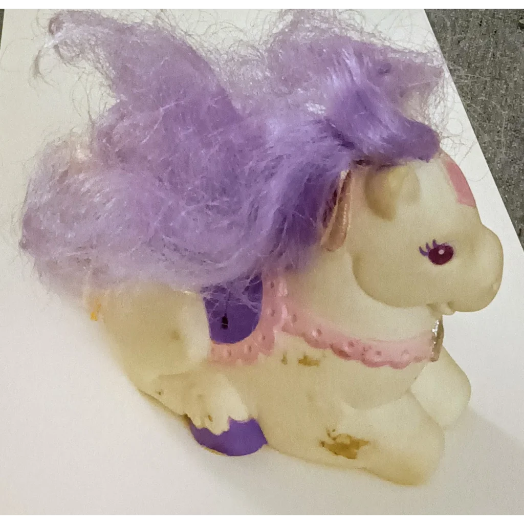 Vintage Keypers Pony Glitter with white body, purple mane, pink saddlebag