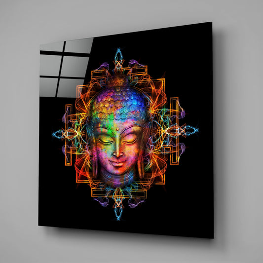 Angled view of illuminated glass wall art displaying a neon-outlined Buddha head with rainbow-colored face against black background, mounted on gray wall.