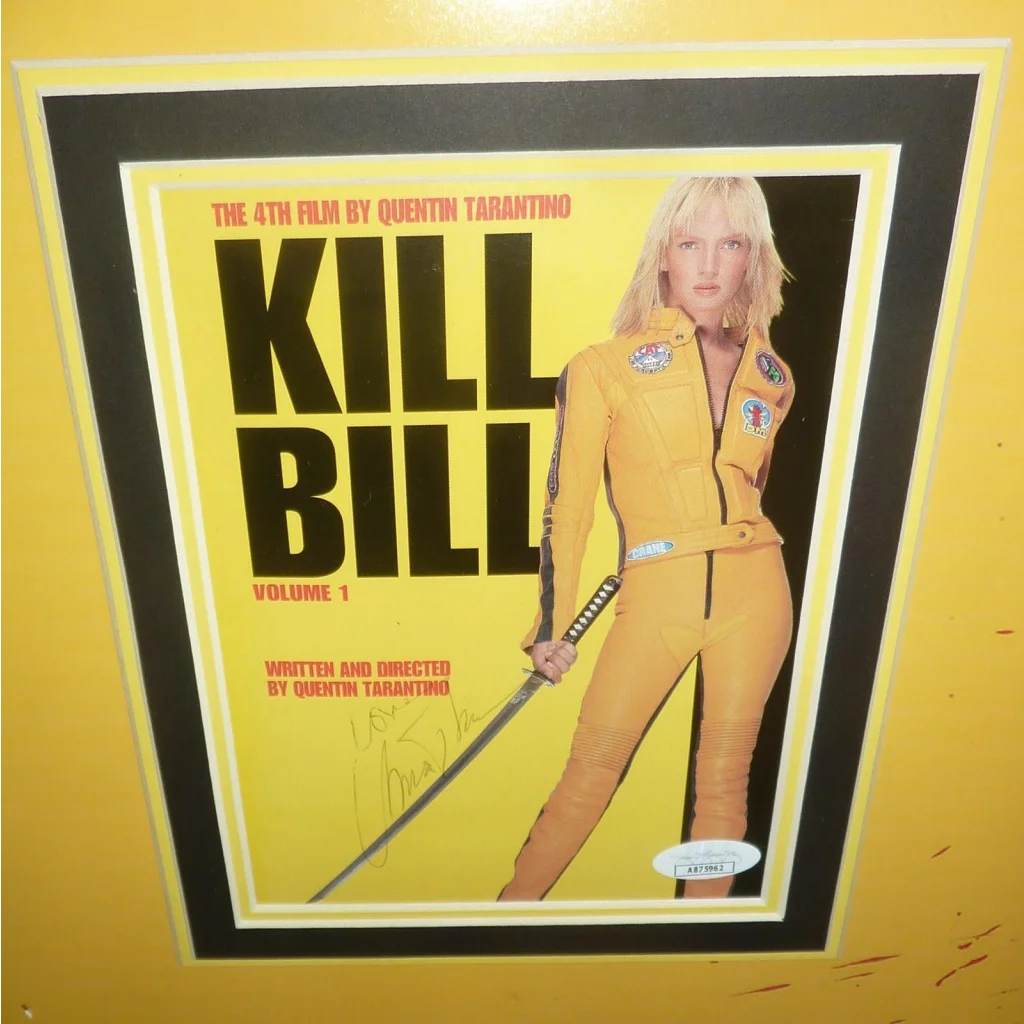 Deluxe framed Kill Bill Volume 1 movie poster with Uma Thurman in yellow jumpsuit holding katana