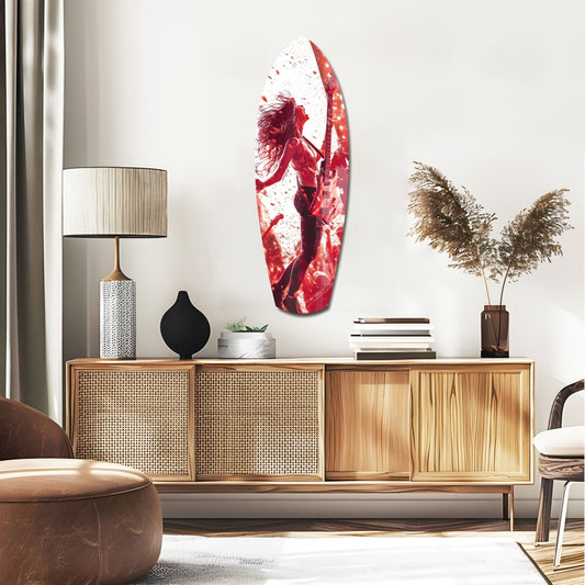 Red and white glass wall art featuring a silhouetted surfer figure, displayed above a wooden mid-century credenza in a modern living room.
