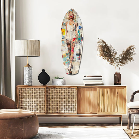 Vintage pin-up starlet glass wall art mounted above wooden credenza in mid-century modern living room setting.
