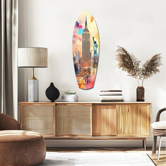 Colorful watercolor glass wall art featuring Empire State Building and Statue of Liberty in vibrant pinks, yellows, and blues, displayed above wooden mid-century modern credenza in styled living room.