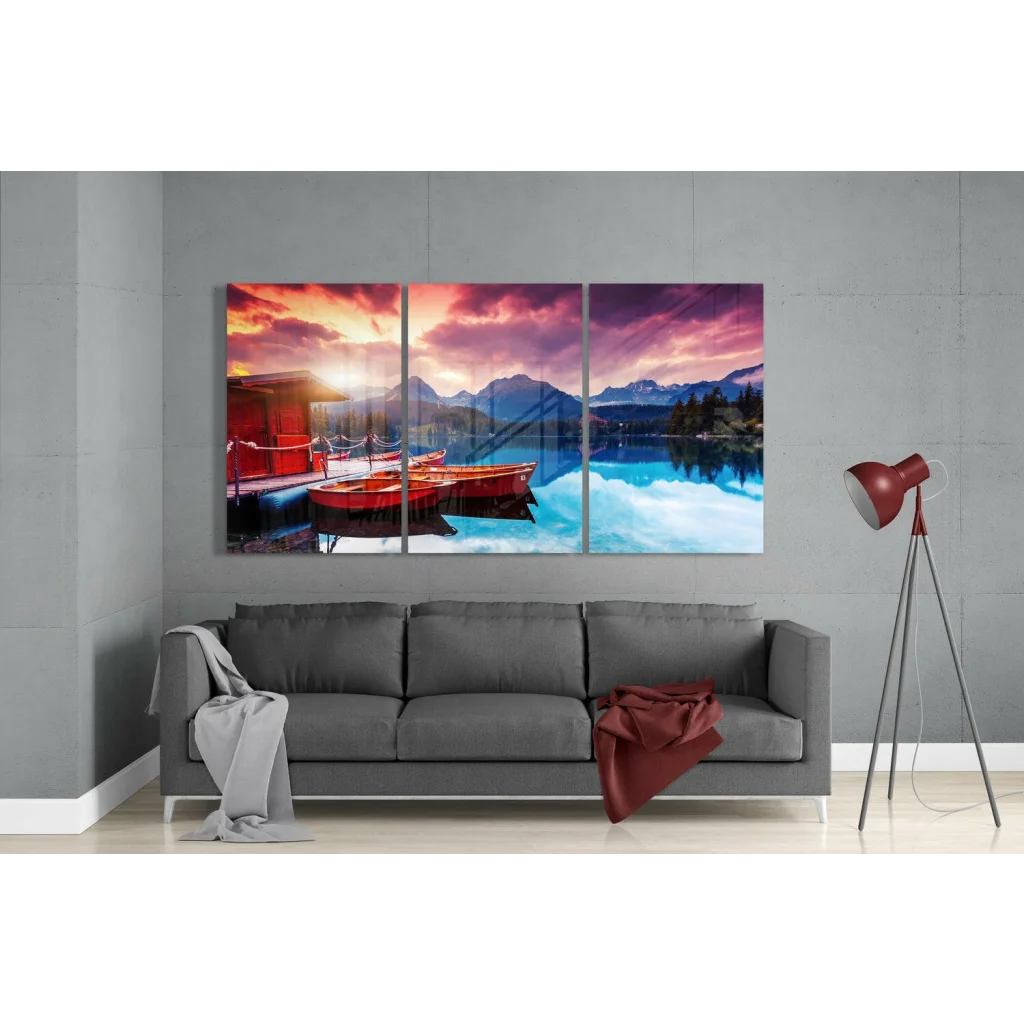 Stunning lakeside sunset triptych wall art with red boats and mountains