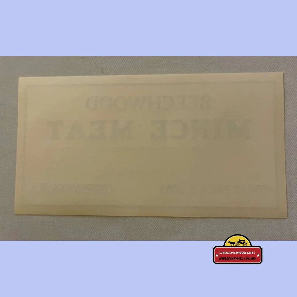 Yellow envelope on a surface showcases an Antique Vintage Mince Meat Label nostalgia