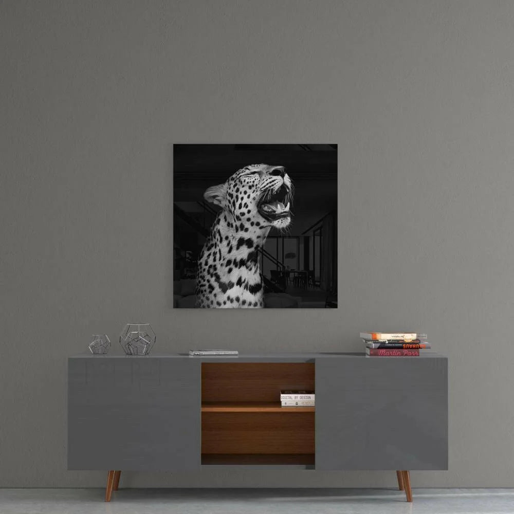 Black and white roaring leopard glass wall art canvas print on wall