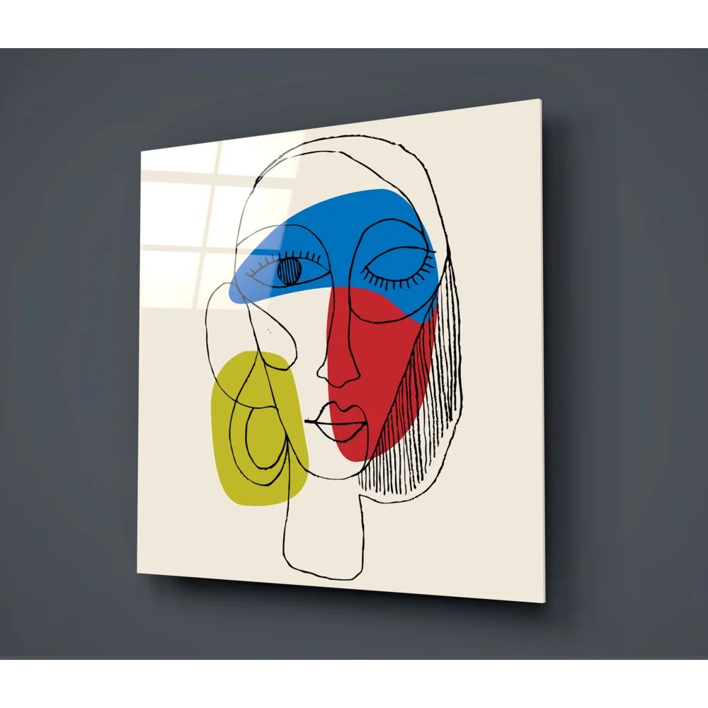 Bold geometric face on tempered glass art panel in blue, red, black