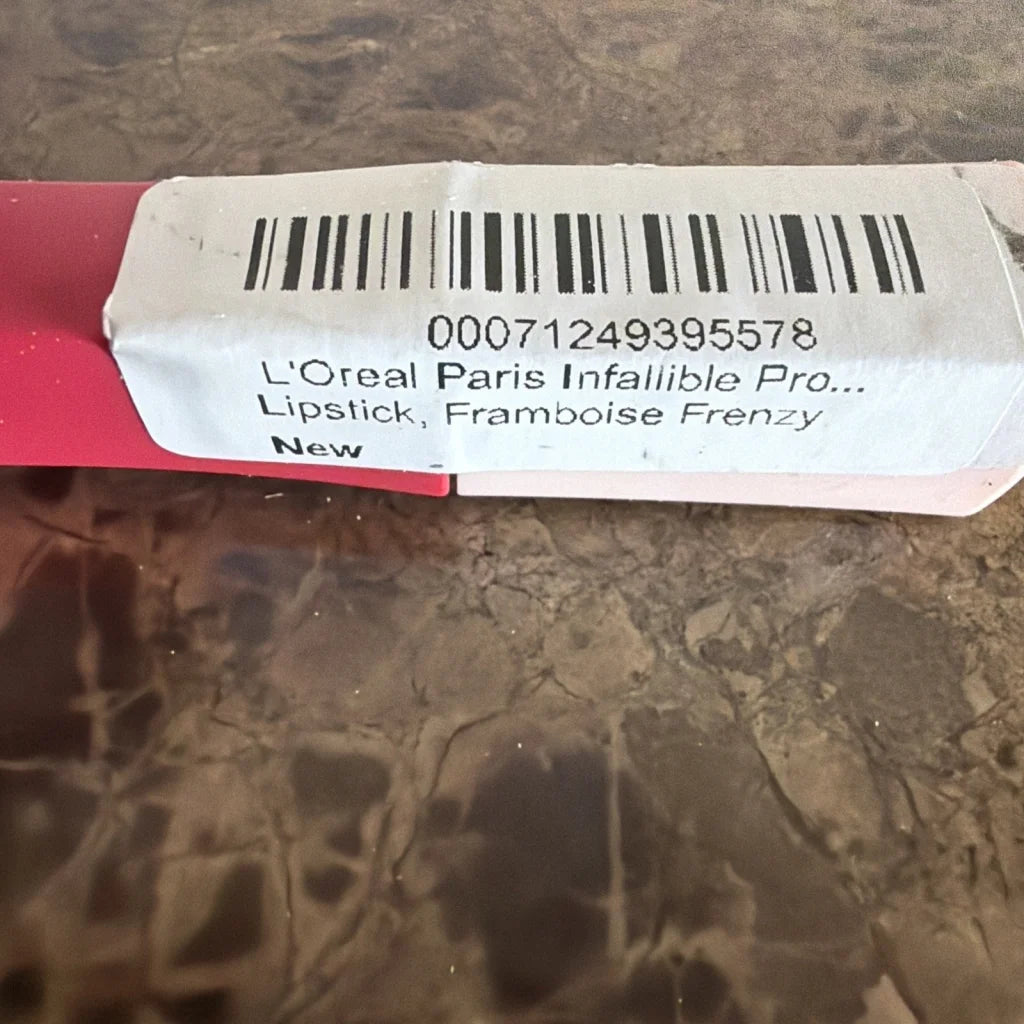 L’Oreal Paris Infallible Lipstick Framboise Frenzy #828 in red tube