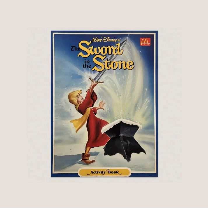 Vintage 1980s Walt Disney stone activity book featuring McDonaldâs Sword from The Sword in the Stone