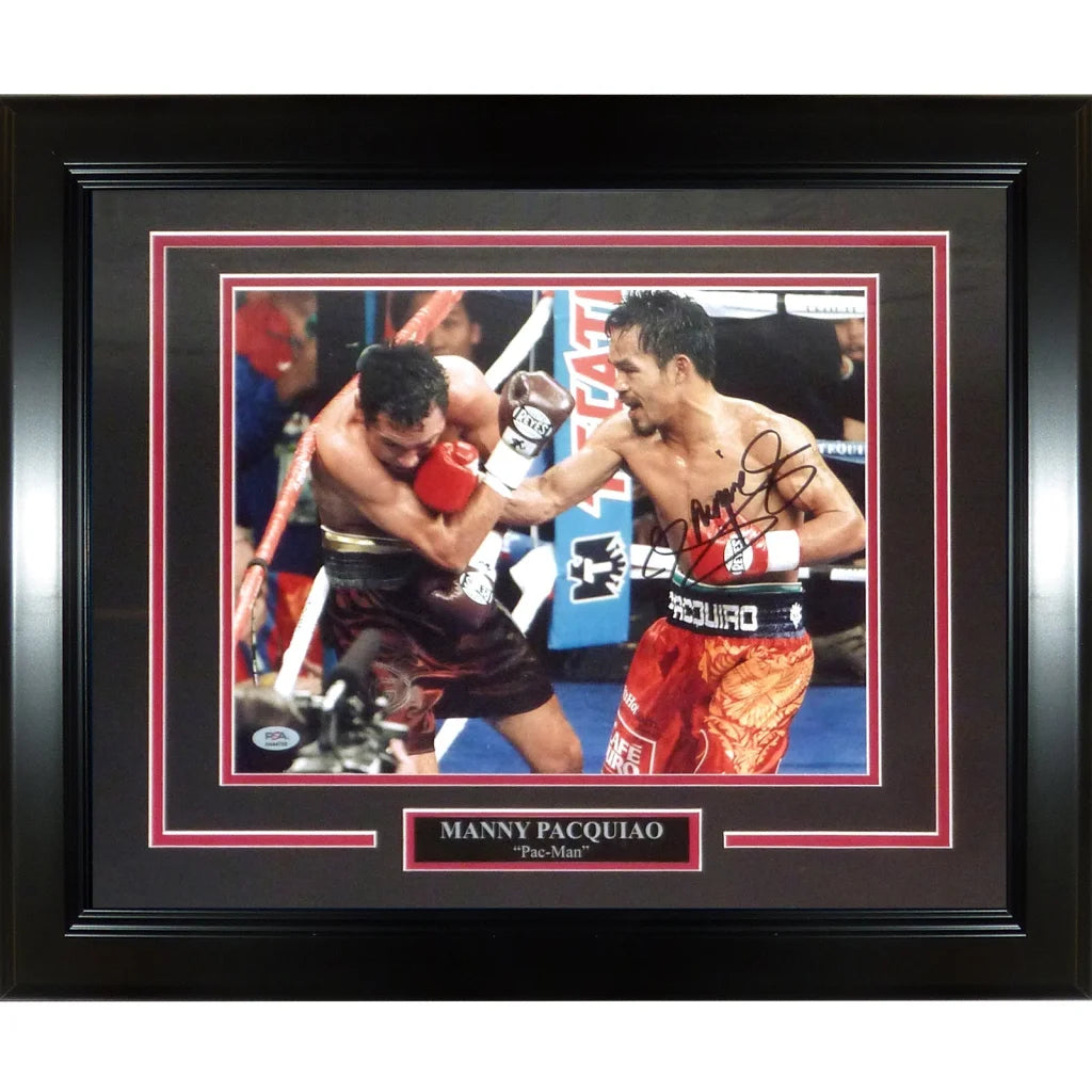 Black framed manny pacquiao autographed 8x10 photo of pacquiao in red and gold trunks during boxing match