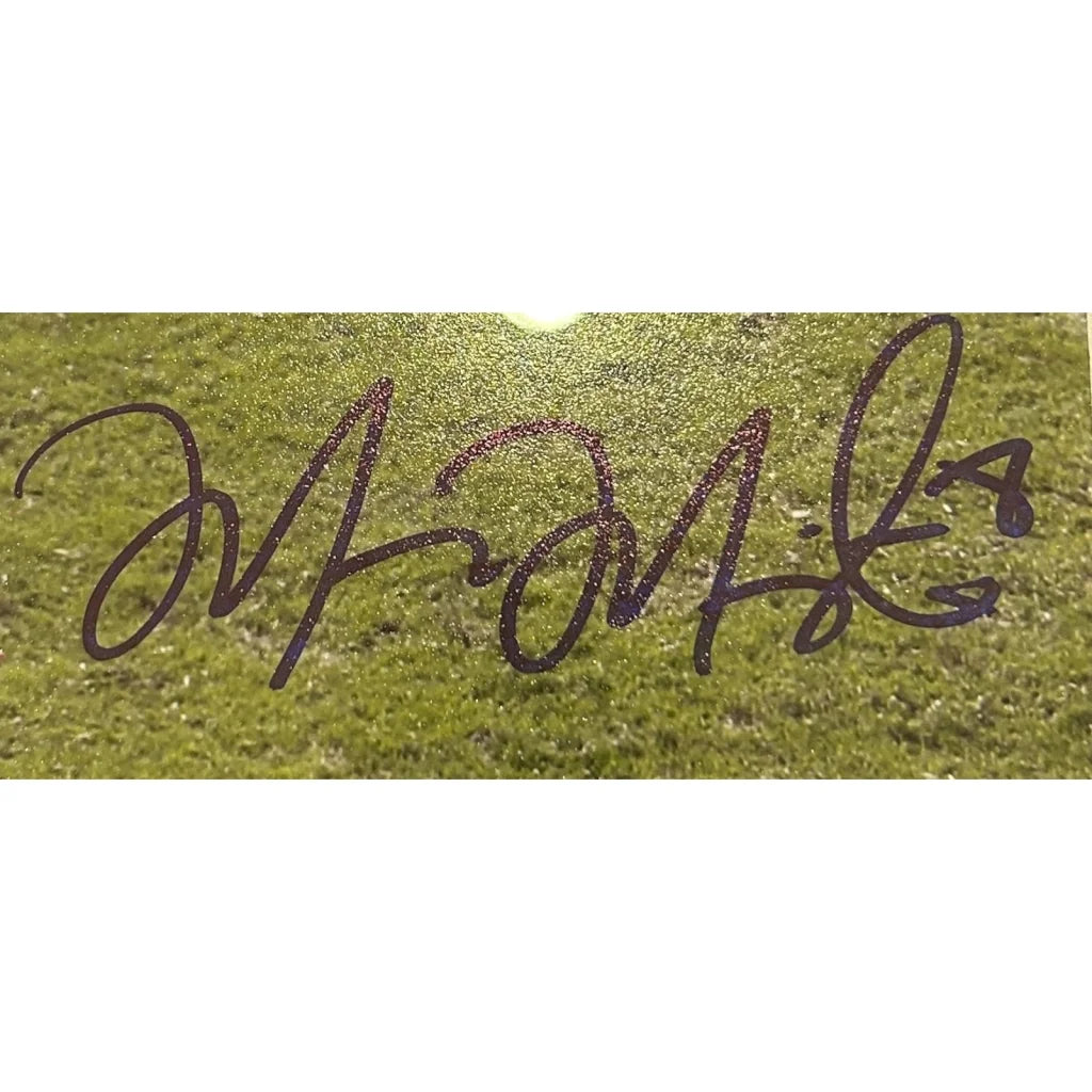 Marcus Mariota first NFL game autographed 8x10 photo with purple and black pen