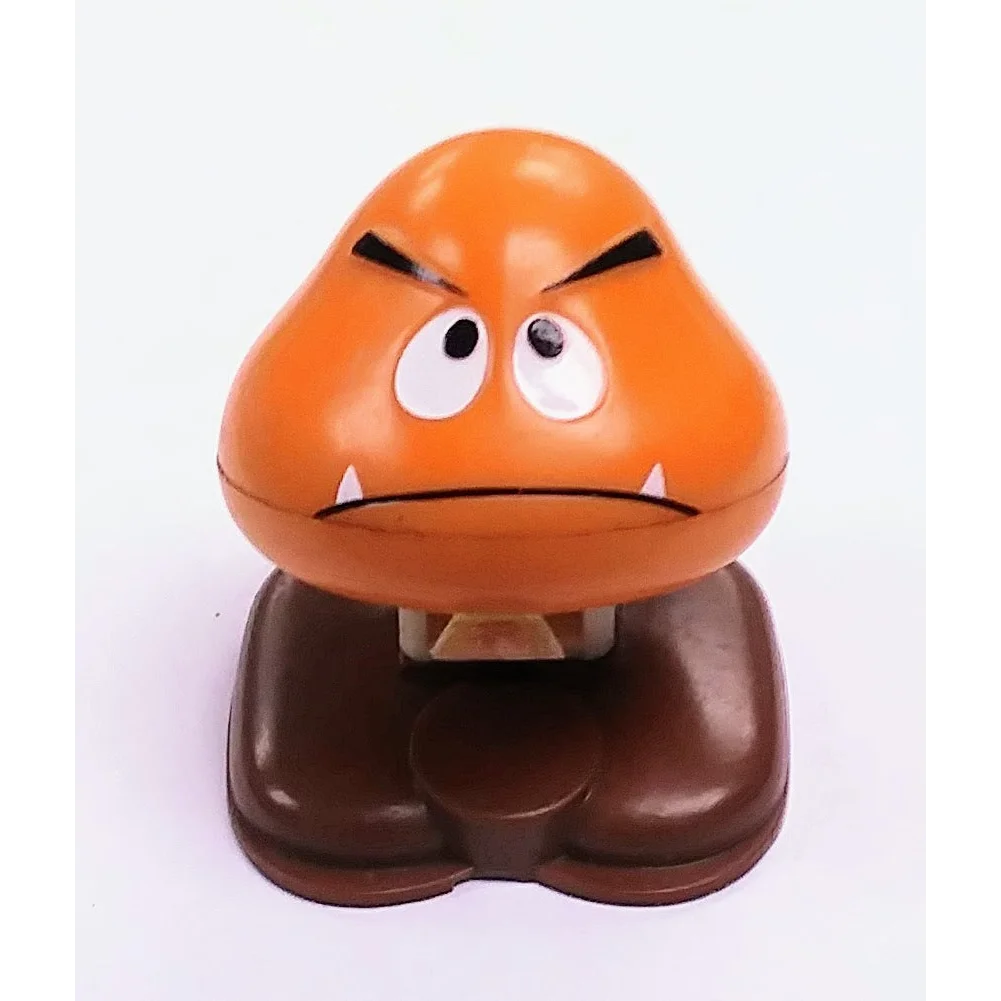 Vintage 1986 McDonalds Mario Goomba happy meal toy with orange cartoon design
