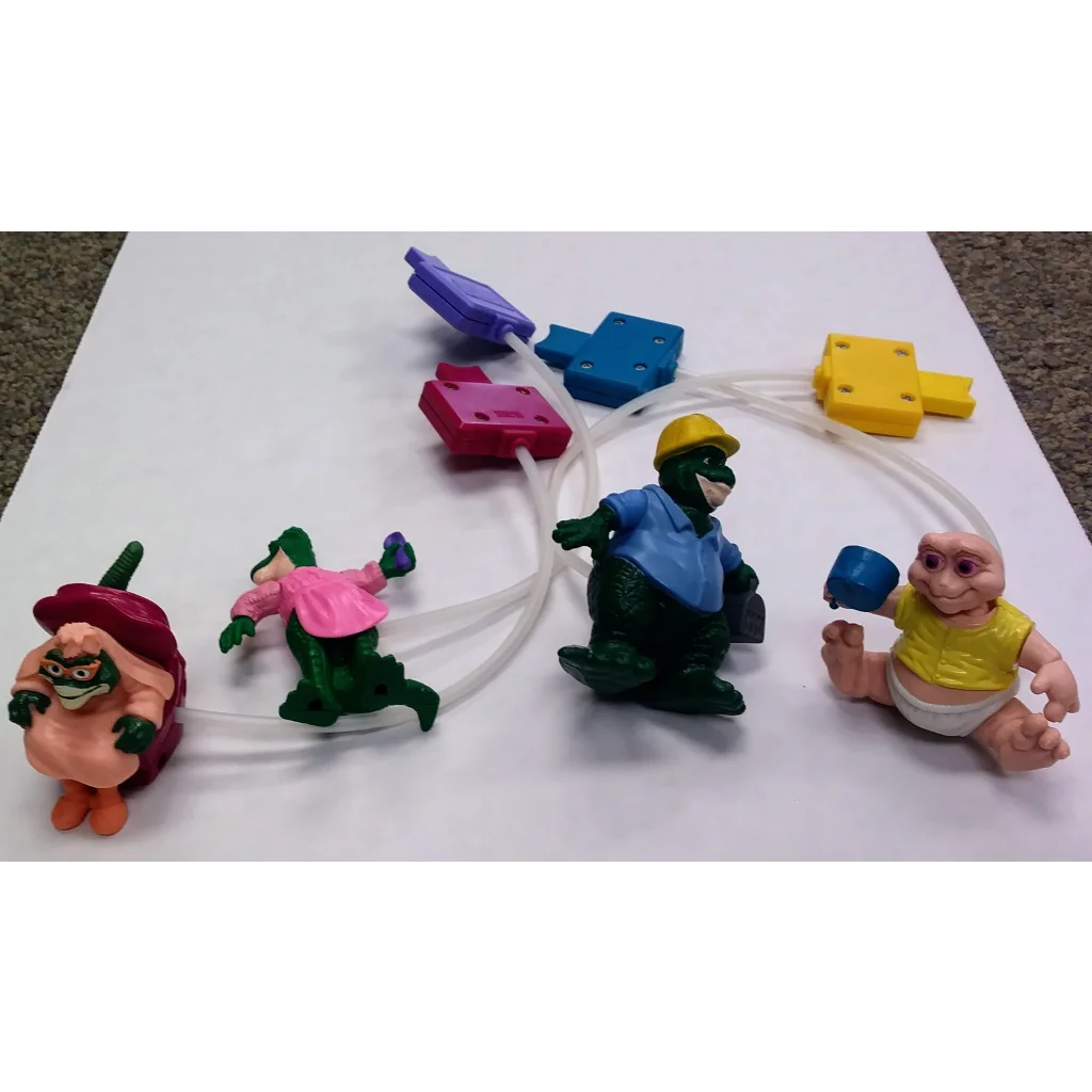 Green frog pump action figure from 1992 McDonalds Happy Meal toy set