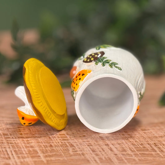 Mushroom trinket box with lid off showing the inside