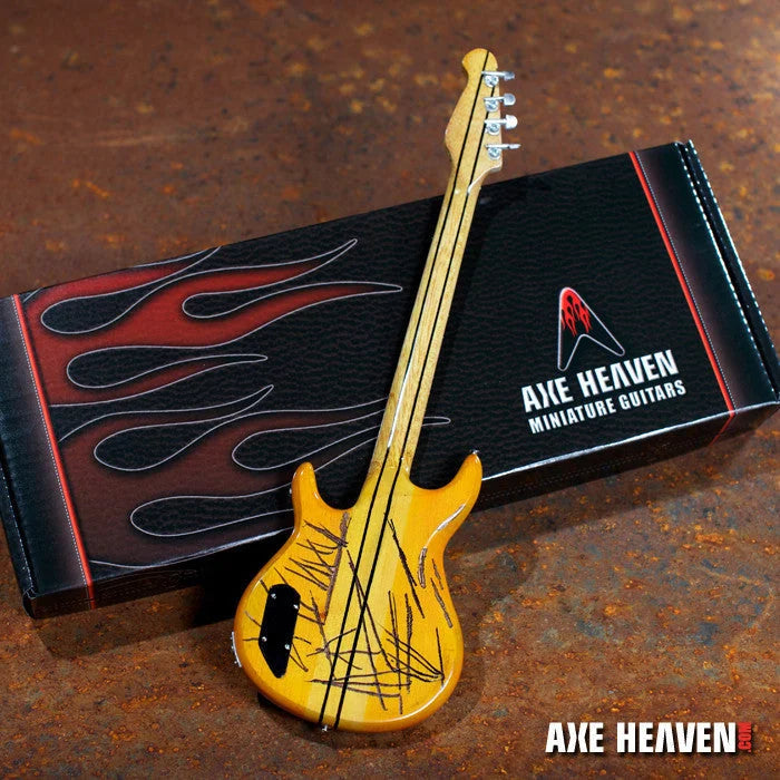 Mini yellow Axe Heaven guitar with black flames in red box