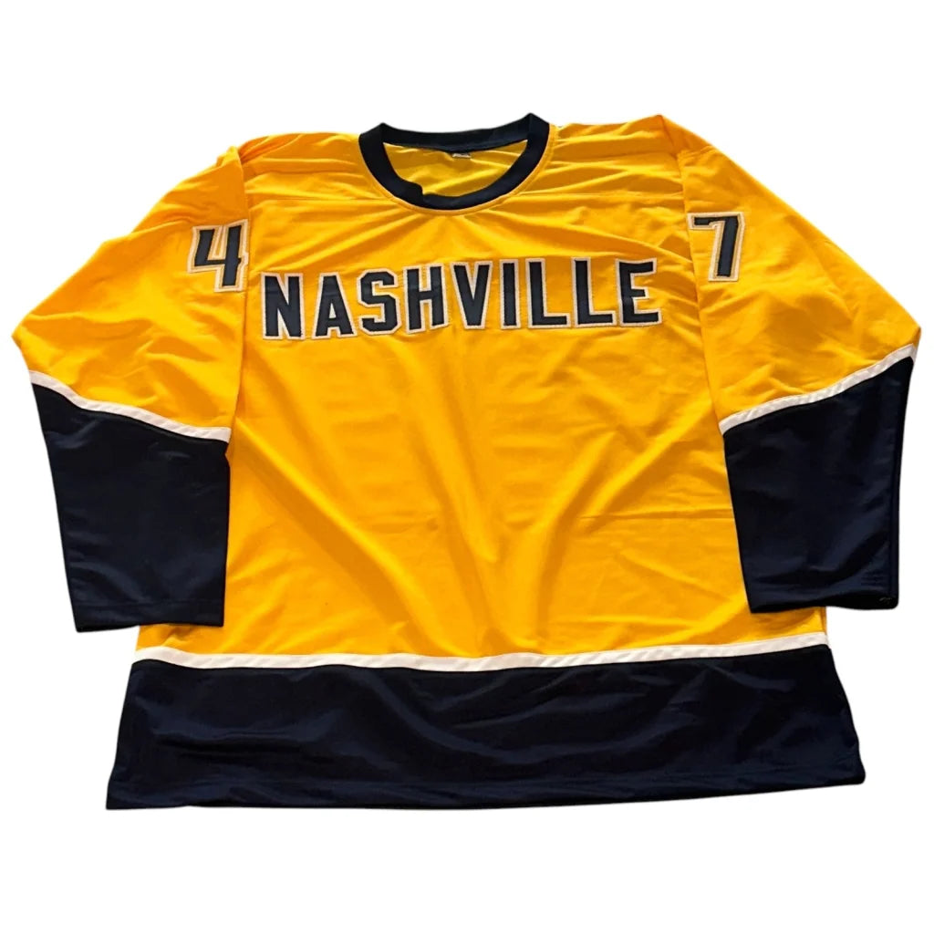Michael McCarron autographed Nashville gold #47 hockey jersey with yellow and navy blue design