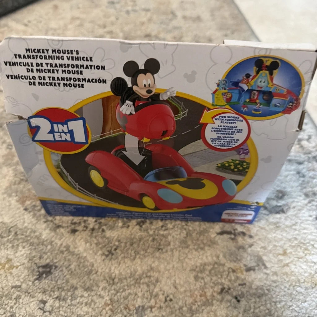 Red and yellow Mickey Mouse Disney Junior transforming vehicle toy in packaging