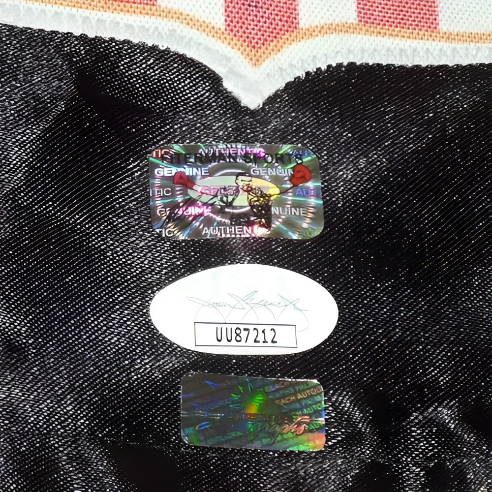Mike Tyson autographed black boxing trunks with holographic stickers and signature card