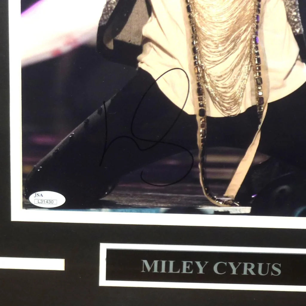 Miley Cyrus autographed 11x14 photo in black boot and gold necklaces, JSA framed