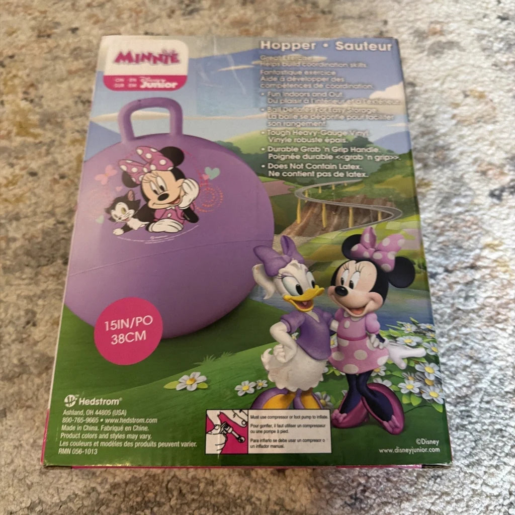 Purple Minnie Mouse hopper with pink polka-dot bow, vinyl exercise ball