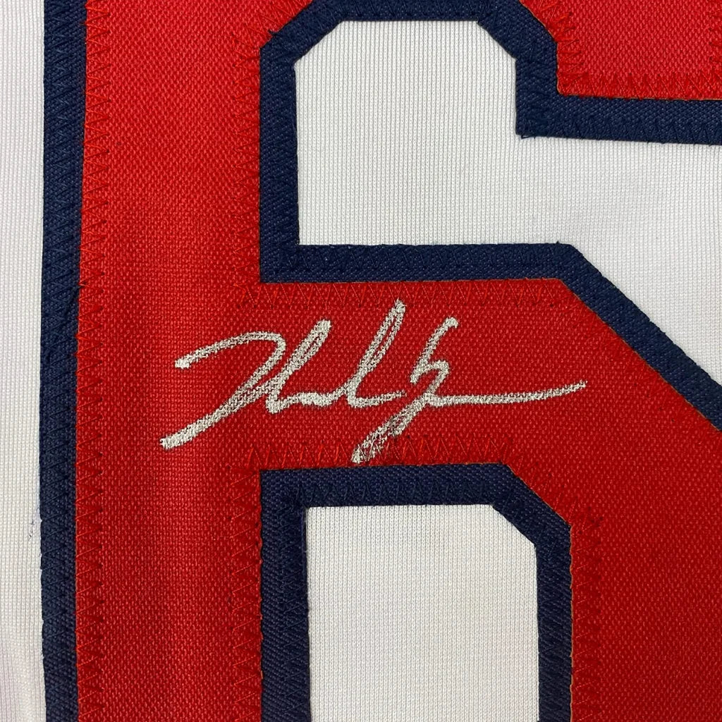 Autographed Nolan Gorman jersey with signature and display ready for wall hanging