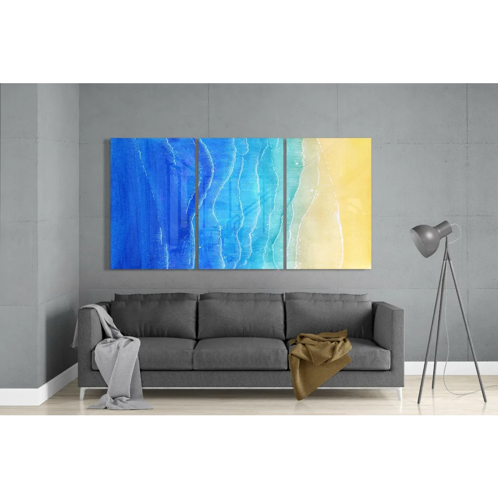 Blue and yellow ocean wave glass wall art triptych with flowing patterns
