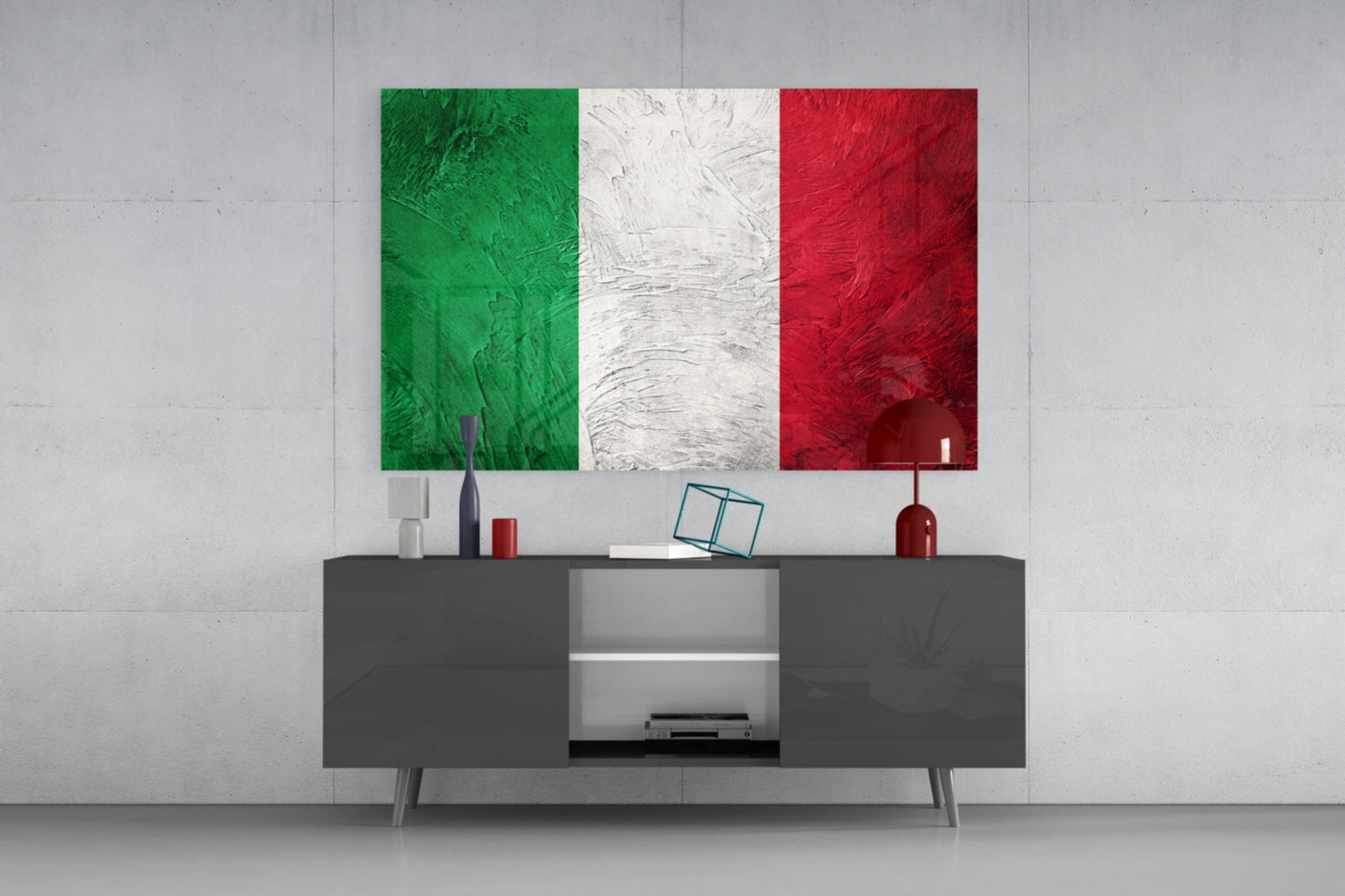 Italian flag glass wall art with textured green, white, and red stripes displayed above a dark media console in a modern interior setting.