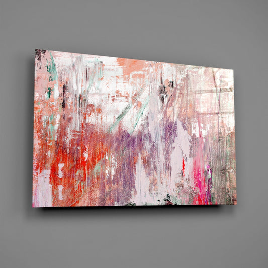 Angled view of coral pink glass wall art with textured abstract brushstrokes in red, purple, white, and teal on gray background.