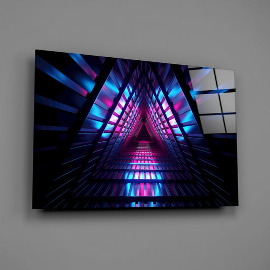 Angled three-quarter view of a glass wall art displaying a neon pink and blue triangular tunnel perspective against a gray background.