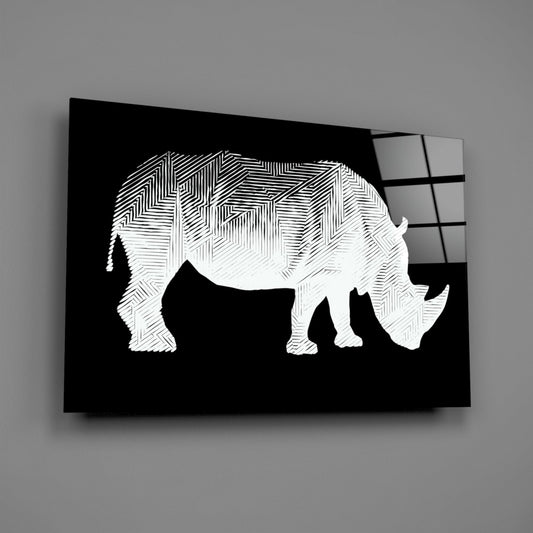 White line-drawn rhino with geometric hatching on black glass panel, angled view showing edge and window reflection.