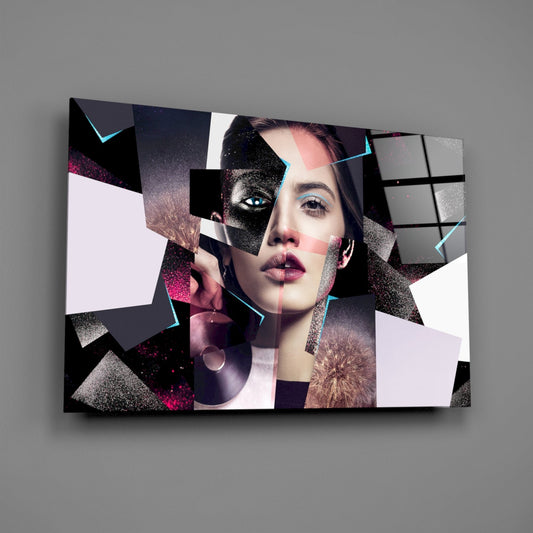 Modern glass wall art displaying a fragmented female portrait with geometric shapes in black, white, pink, and glitter textures with cyan accents, mounted on gray wall.