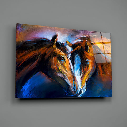 Two chestnut horses with white blazes nuzzling together, rendered in vibrant blues, golds, and oranges on a glass panel mounted on gray wall.