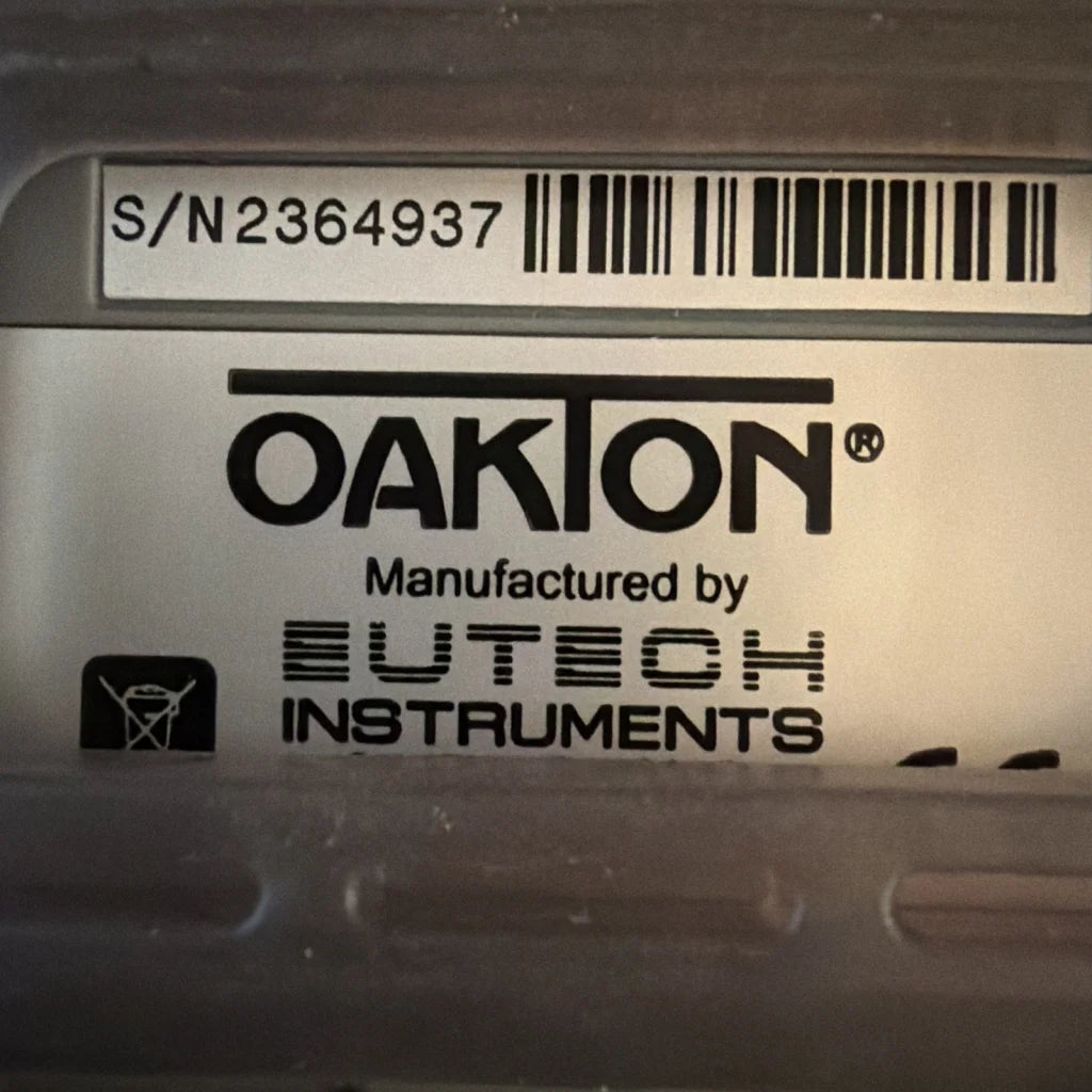Oakton silver label with barcode on handheld salinity meter back
