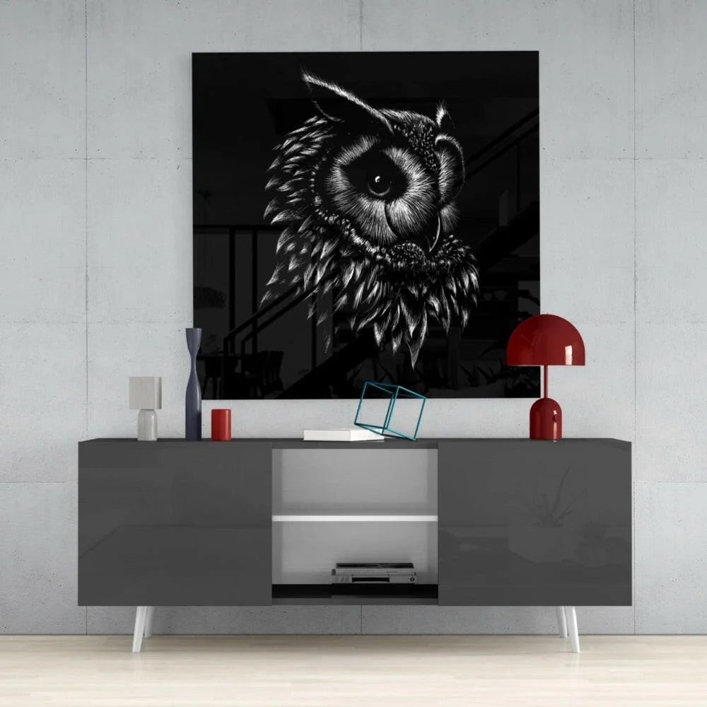 Stylized black and white owl glass wall art with intricate feathers on glossy canvas