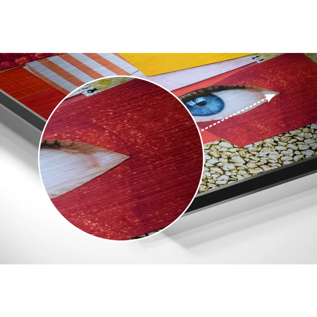 Vibrant red textured canvas with bold blue eye on brushed aluminium dibond