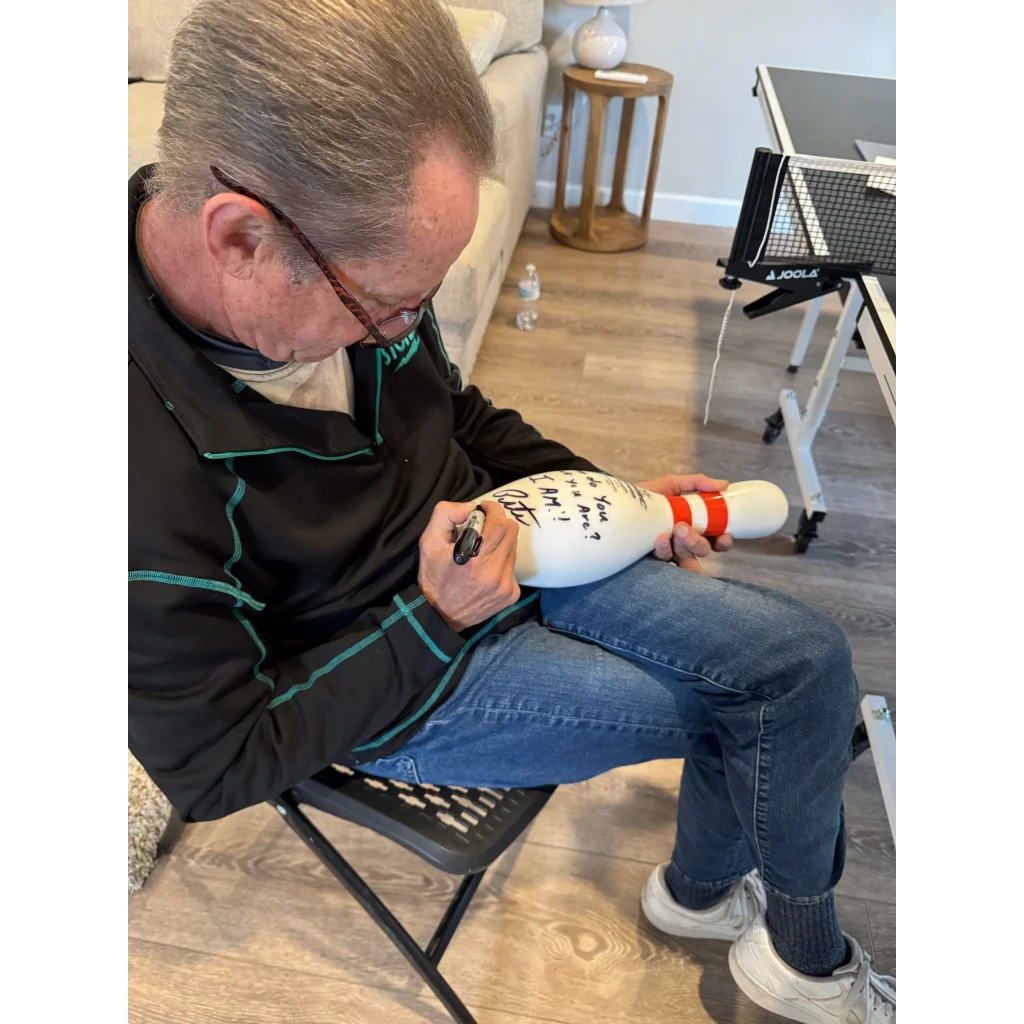 Pete Weber autographed bowling pin with red white stripes and signatures