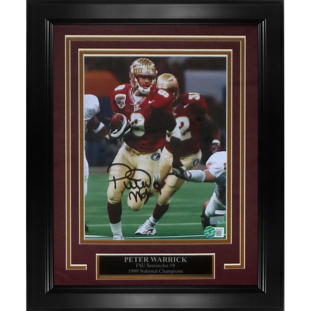 Black-framed maroon and gold-trimmed seminoles deluxe framed 8x10 photo of peter warrick autographed in red lsu jersey