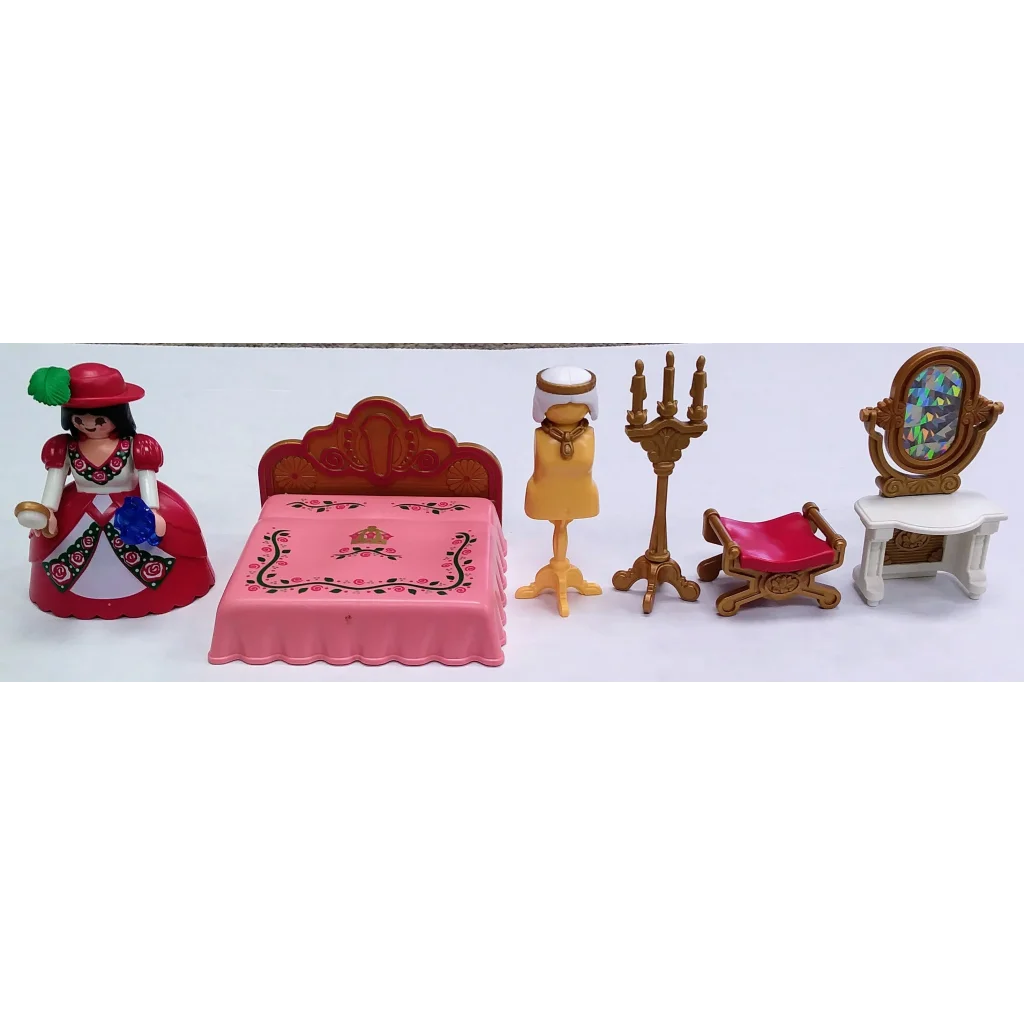 Playmobil set royal bedroom with 18th century dollhouse furniture, pink bedding and Marie Antoinette figurine