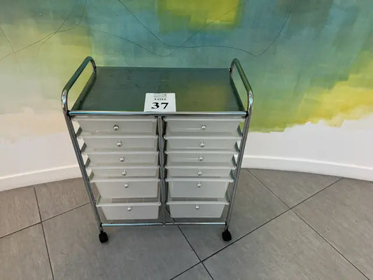 Front view of 12-drawer rolling organizer cart with clear plastic drawers, metal frame, and price tag 37 on top.