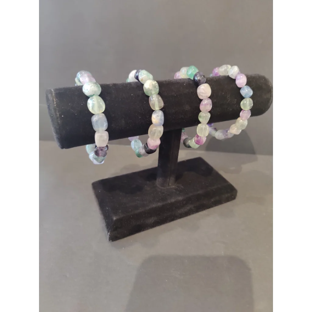 Three rainbow fluorite beaded bracelets in dreamy pastel pink, green, lavender
