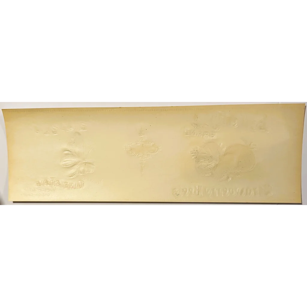 Antique 1900s butterfly gold embossed cream-colored paper label for vintage products