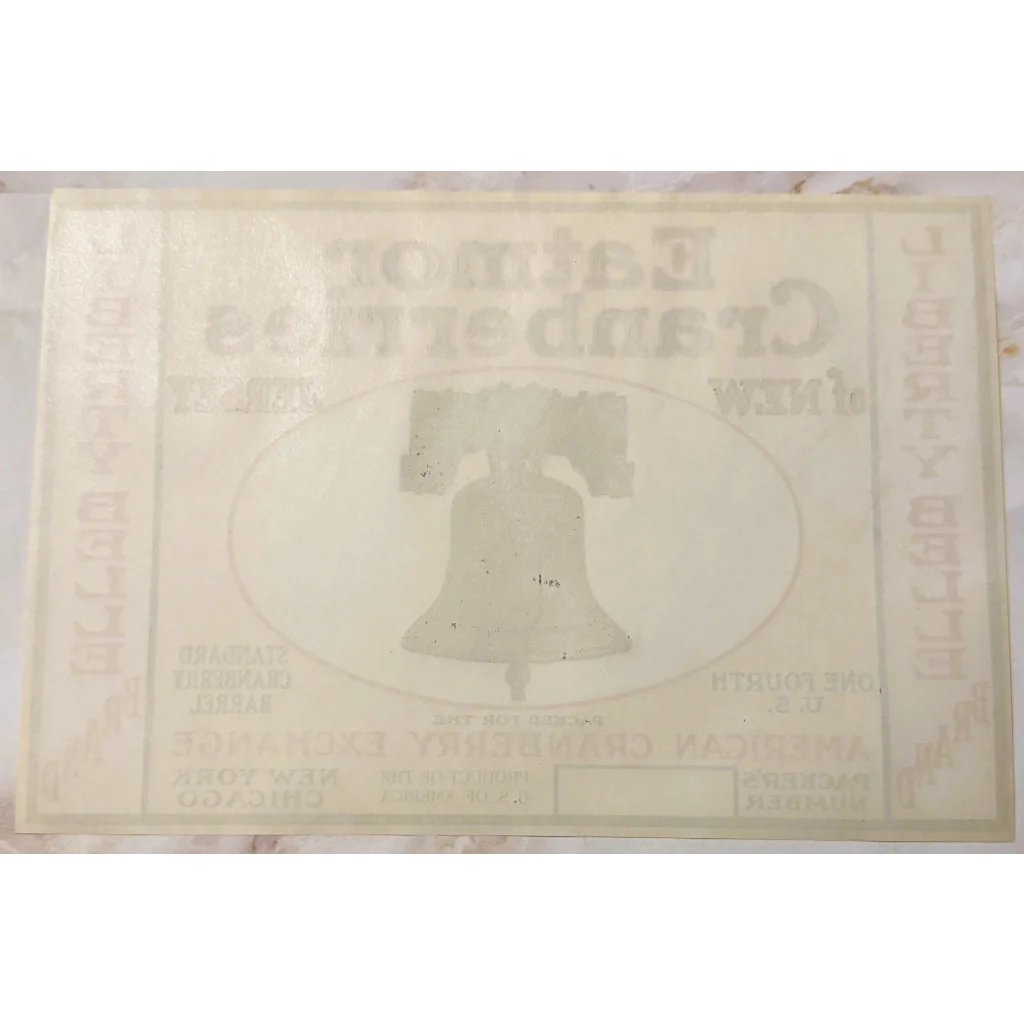 Liberty Bell watermark on paper from Rare 1920s Eatmor Cranberries label