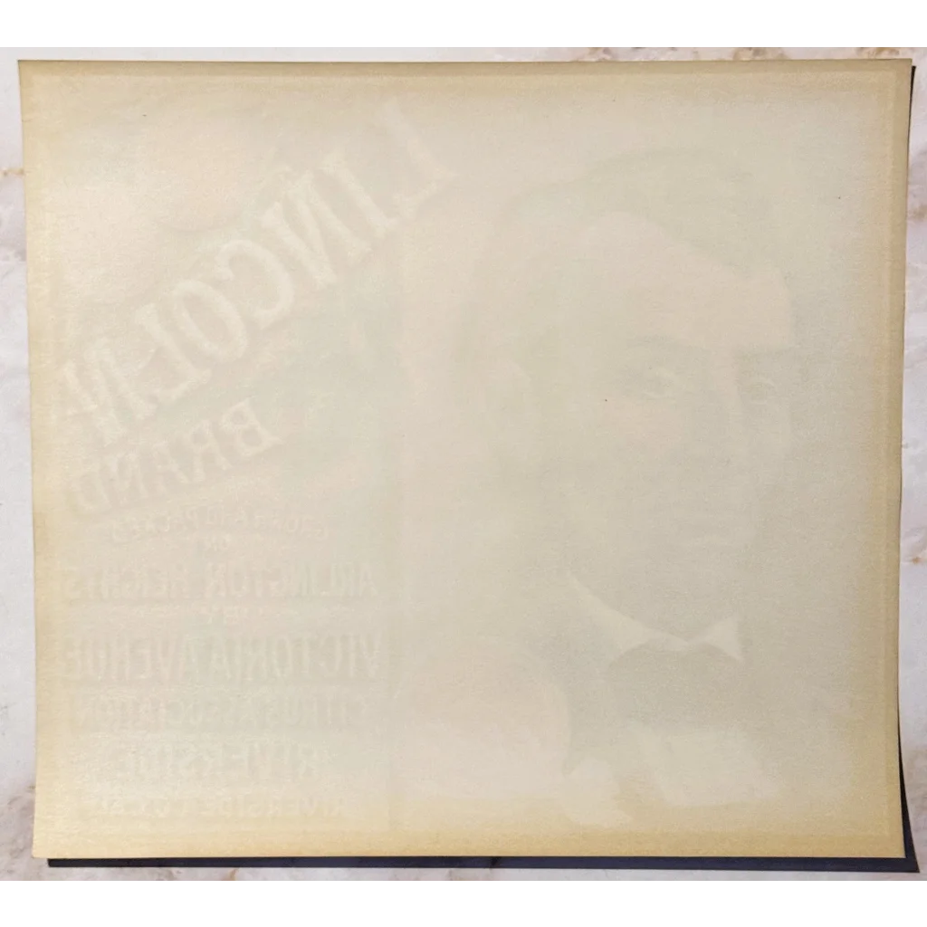 Off-white aging paper adding vintage charm to the Rare 1930s Lincoln Sunkist Orange Label