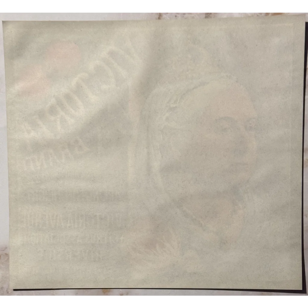 Blank white paper with creases, perfect for showcasing Rare 1930s Victoria Sunkist Orange Label