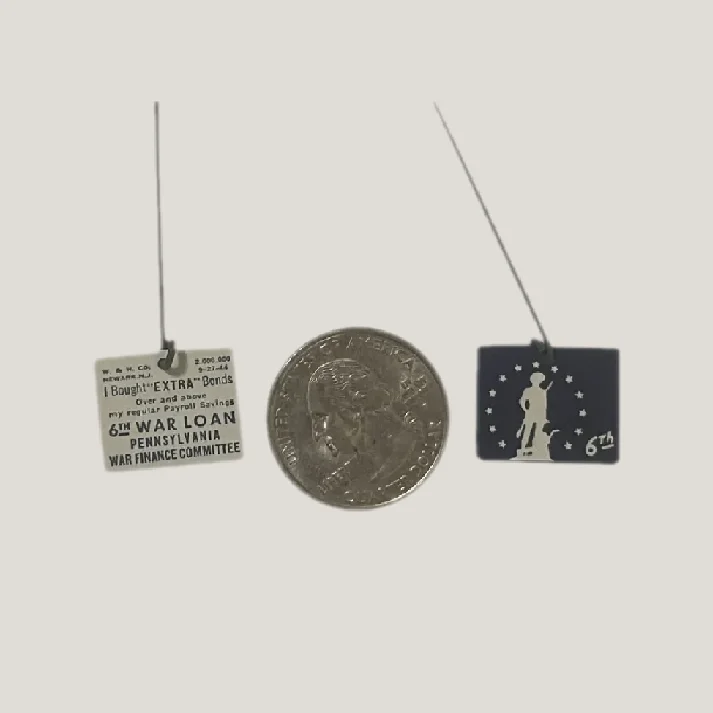 Vintage WWII War Bond pin and quarter from the 1940s patriotic antique collection