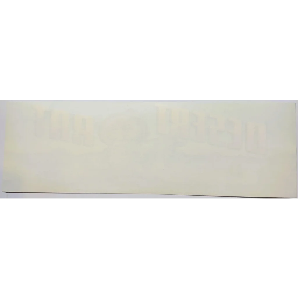 Rectangular off-white crate label from vintage 1960s Desert Rat crate found in Queen Creek