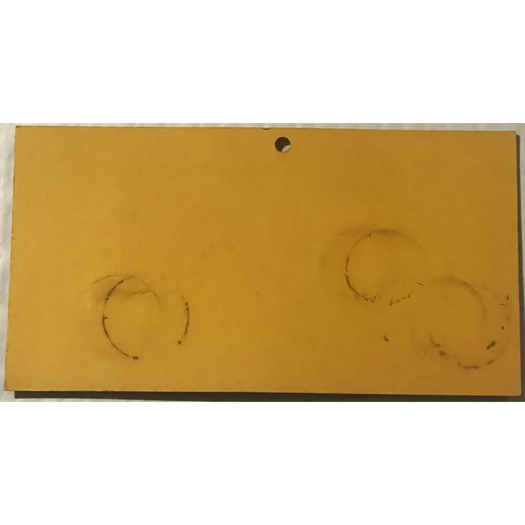 Yellow rectangular panel with circular stains on Rare Antique Vintage Hein Brothers Advertising Display