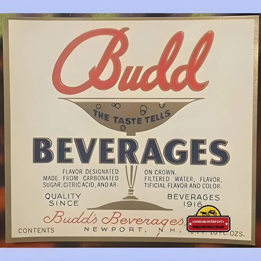 Vintage white beverage label reading "Budd Beverages," red script, navy text, cocktail glass graphic.